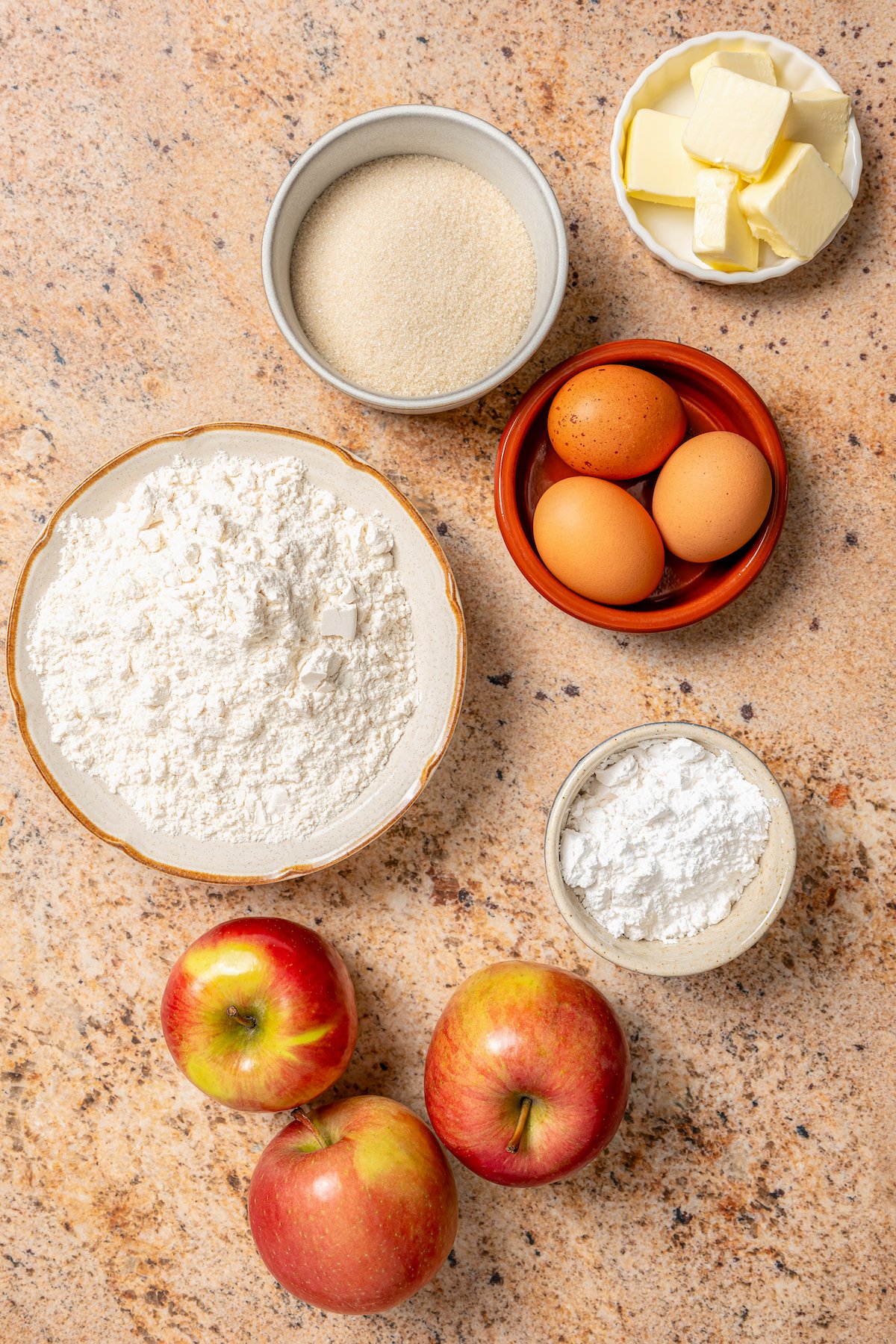 Ingredients for making apple cake. 