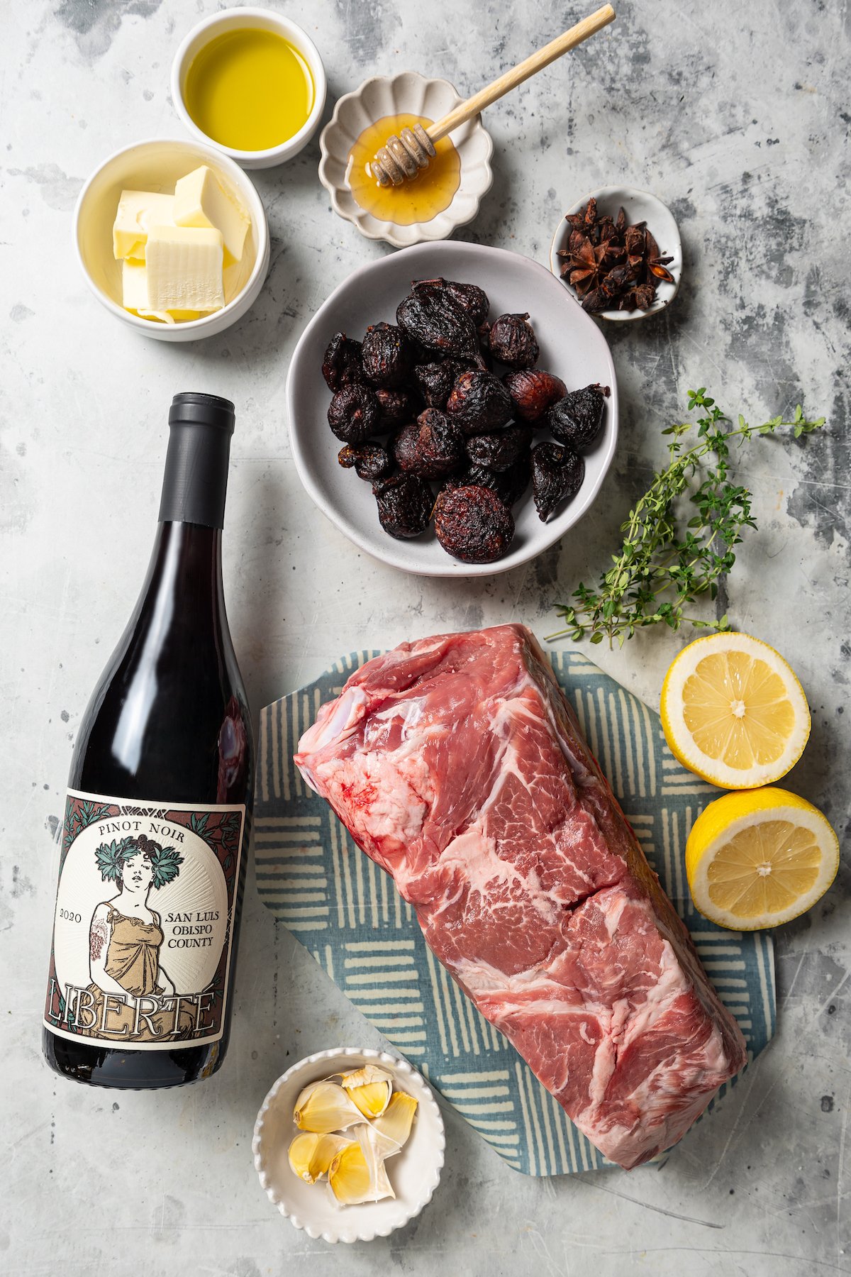 Ingredients for making the roasted pork shoulder recipe with fig sauce. 