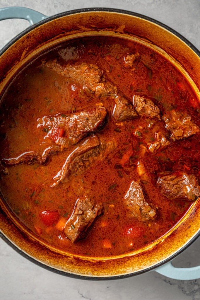 Cooked short ribs in the Dutch oven. 